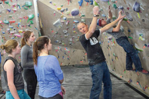 Dave Meyer, a Colorado Rocky Mountain School (CRMS) coach, works with team climbers on dialing in technique. In the longterm model, focus should be on gaining technique, then endurance, and last strength.