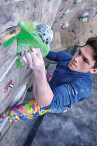 Colin Daniels, age 17, can handle an advanced workload, but young climbers are vulnerable to fractures in the growth plates of the fingers. Injury may occur or first present in stressful positions such as full crimping (as demonstrated). Instead favor the half (open) crimp in training and minimize use of the full crimp when climbing.