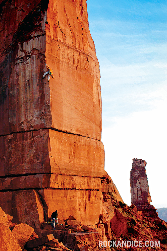 Tom Adams styles Excommunication (5.13b), one of a new generation of crackless tower routes, on the Priest, Castle Valley, Utah. Photo: Duane Raleigh.