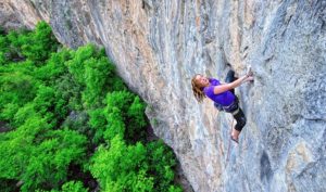 Ciara Rinaudo high, but still 20 feet below the crux, on Easy Skankin. Photo: Keith Ladzinski.