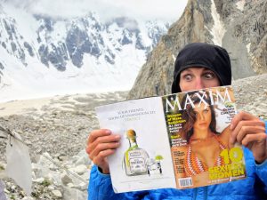 Kennedy catching up on some reading in basecamp. Photo: Kyle Dempster.
