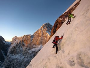 Wharton and Kennedy set out at first light on the second day. The Ogre 2 looms in the background. Photo: Kyle Dempster.