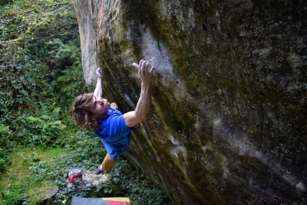 Taylor McNeill on Elephunk (8B/V13), Fontainebleau, France. Photo: Dawn Davis.