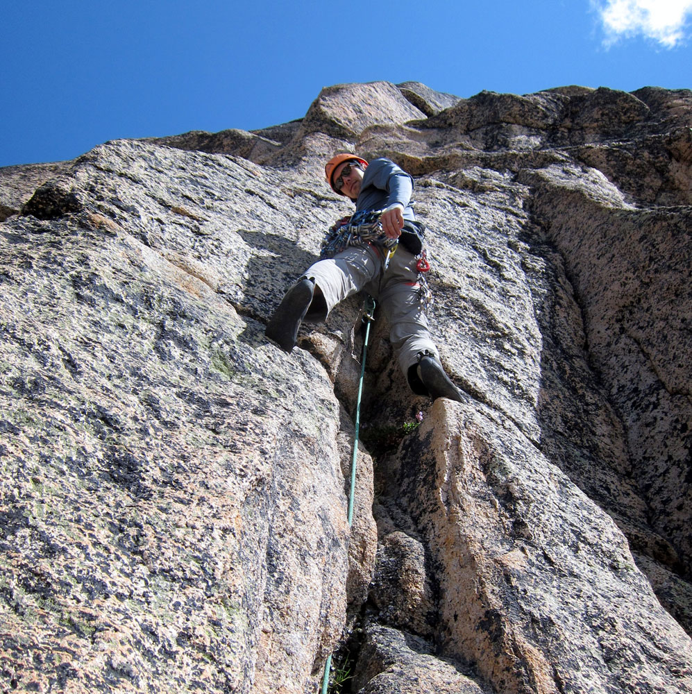 Baylor makes quick work of the fourth pitch of the West Face (5.11-) of North Early Winter Spire. Photo courtesy of Mark Kroese.