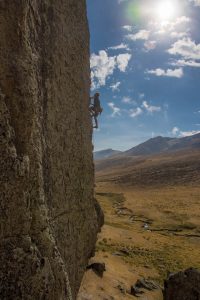 Fabian Freudig high above the crux on Chucru Rani (6a+/5.10c), an exposed 17-meter route bolted in 2006. Photo: Josh Laskin.