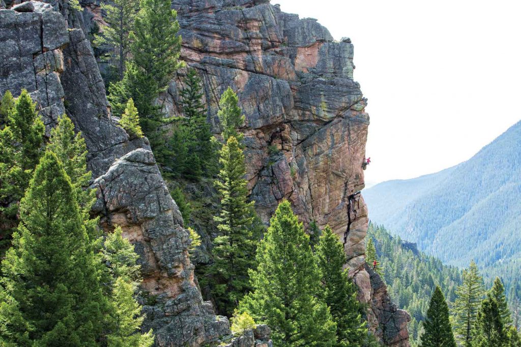 Aki Joy on Run Like Hell (5.10c), Gallatin Canyon, Montana. Photo: Seth Langbauer.