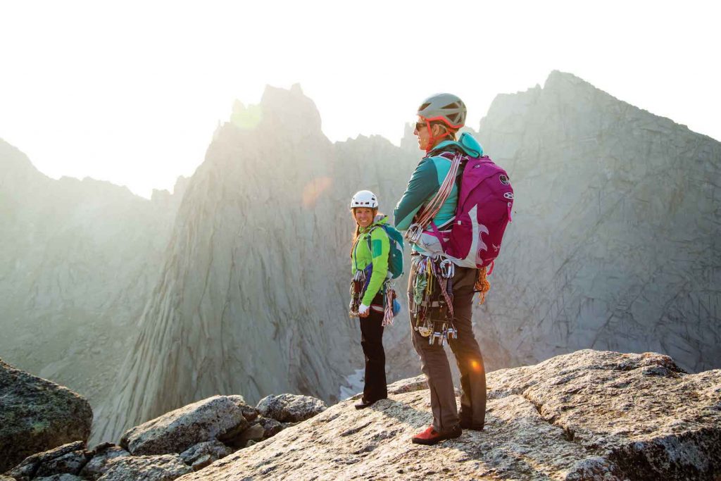 Kim Havell and Julia Heemstra take in the view from the summit of Pingora, Cirque of the Towers, in Wyoming's Wind River Range. Photo: Dan Holz.