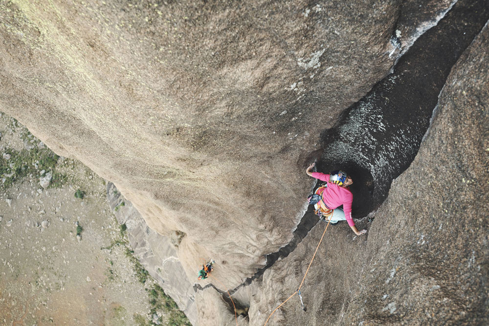DiGiulian enters the water-eroded “tunnel-like formation” on the upper half of <em>Mora Mora</em>. Photo: François Lebeau / Red Bull Content Pool. DiGiulian enters the water-eroded “tunnel-like formation” on the upper half of <em>Mora Mora</em>. Photo: François Lebeau / Red Bull Content Pool.