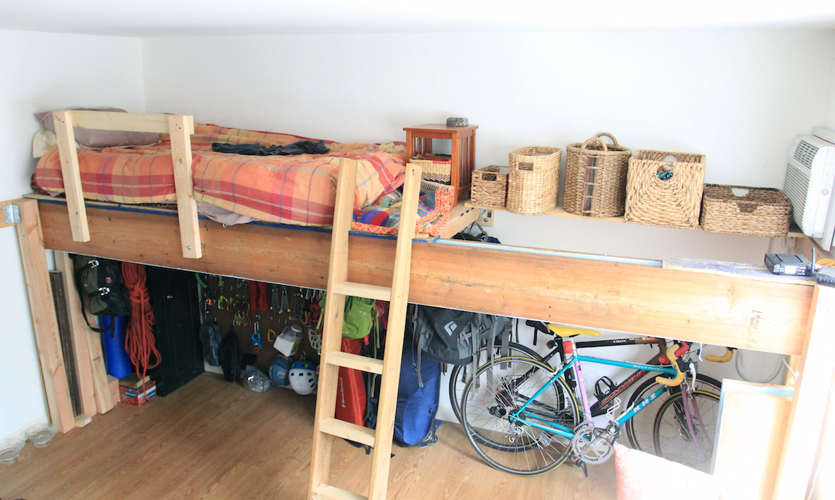 Author Anthony Johnson killed two birds with one crack. The frame of his lofted bed doubles as a roof hand crack.