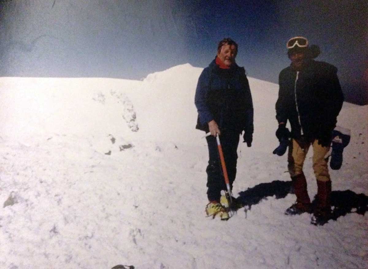 Roy (left) on the summit of Mt. Elbrus (18,510 feet), the highest mountain in Russia and Europe, with his personal Roy (left) on the summit of Mt. Elbrus (18,510 feet), the highest mountain in Russia and Europe, with his personal