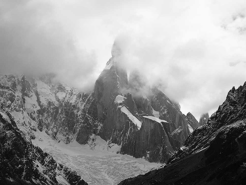 Cerro Torre shrouded in clouds. Photo by Kelly Cordes.