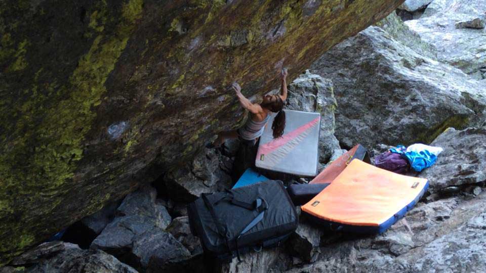 Alex Puccio climbing her first V14, <em>Jade</em> in RMNP, earlier this summer. Photo by Joel Zerr.