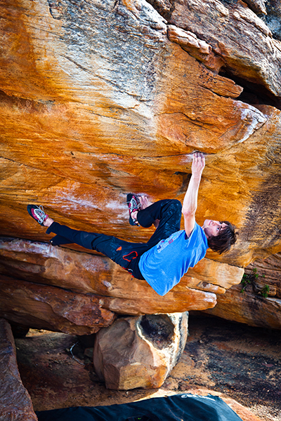 Graham on <em>Sky</em>, a Daniel Woods V14 in Rocklands, South Africa. Graham sent this line early in the evening and then went on to climb <em>Derailed</em>, another V14, in the dark. One of his best days ever, in July 2012. Photo: Cameron Maier.