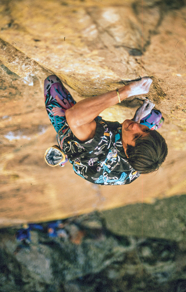 John Duran on his route <em>A Date with Death</em> (5.13+) in the Sandia Mountains, New Mexico. Duran climbed the line on trad gear in 1989. It remained unrepeated until 2012 when Cody Roth climbed and confirmed the route at 5.13c/d. Photo: David Benyak.