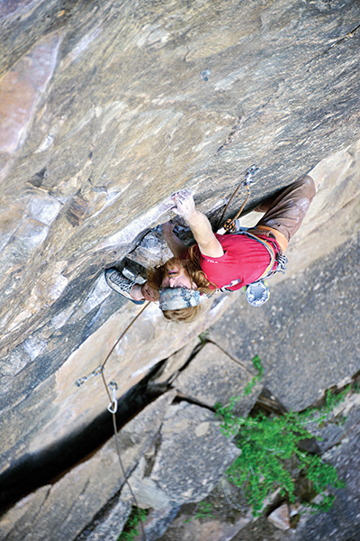 Richie Hum sips from the <em>Holy Grail</em> (5.11d). Photo: Keith Ladzinski.