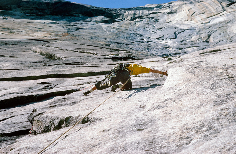 Pratt takes tension to reach a feature on the wall's lower slab. Photo: Royal Robbins Collection.